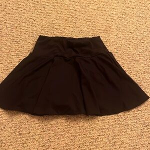 Black tennis skort with pockets